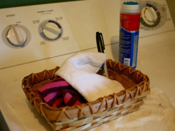 dusting with socks laundry area