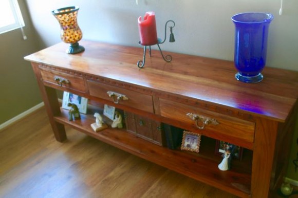 dusting with socks console table