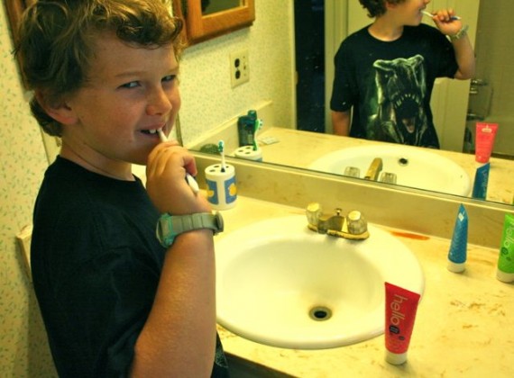 boy brushing teeth
