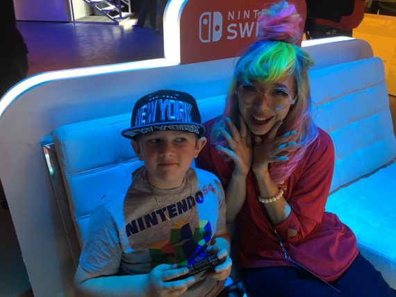 video game player and girl with multicolored hair
